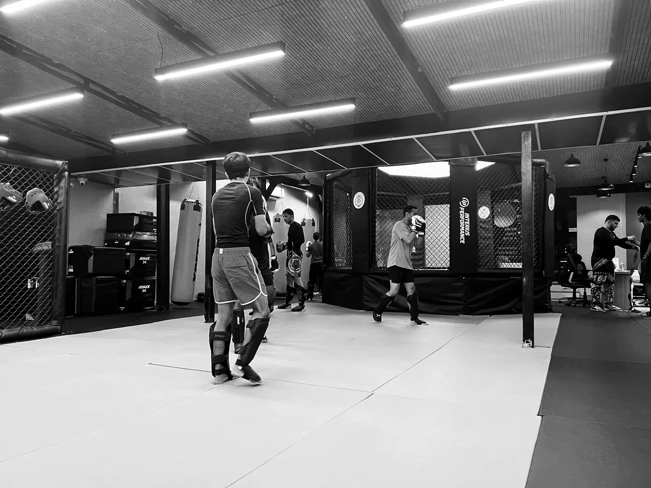 Members drilling on the matted training floor